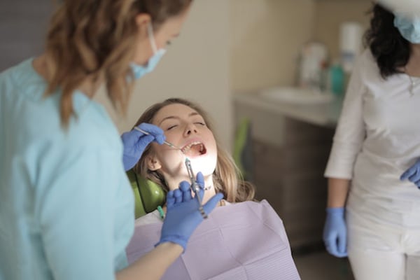 dentist administering local anesthetic